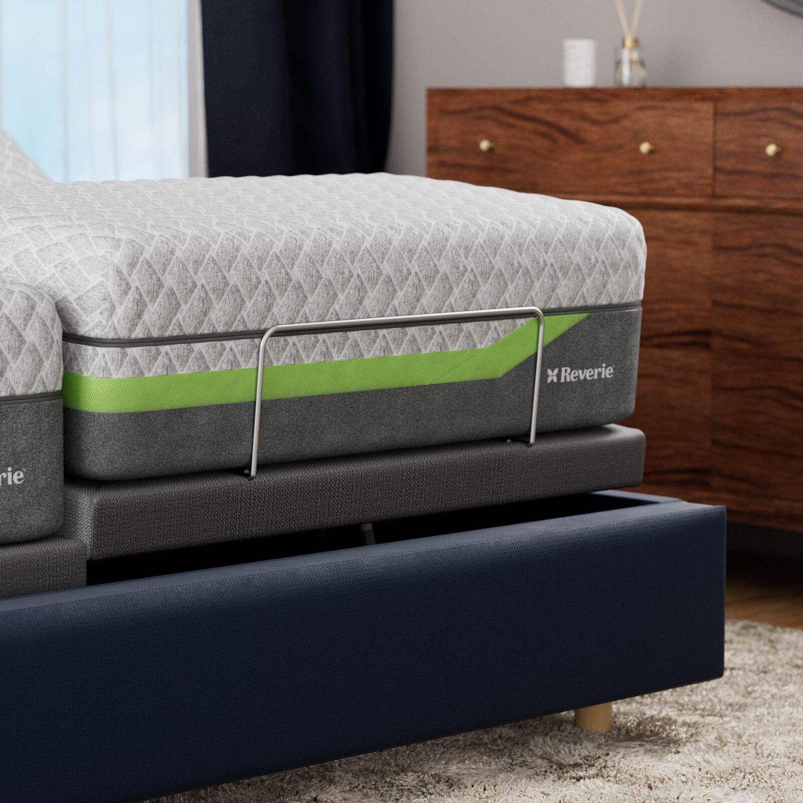 Reverie mattress with green stripe in a bedroom setting
