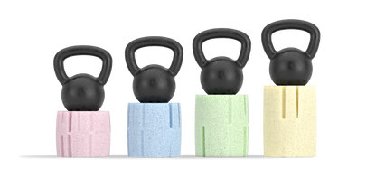 Picture of Reverie natural Talalay latex foam springs. Firmness displayed by showing kettle bells on top, with pink (extra soft), blue (soft), green (medium) and yellow (firm). 