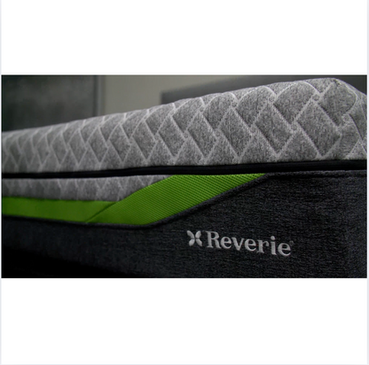 Gray mattress with green accent and 'Reverie' logo on a white background