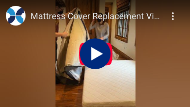 Video thumbnail for mattress cover replacement video with a blue play button overlay.