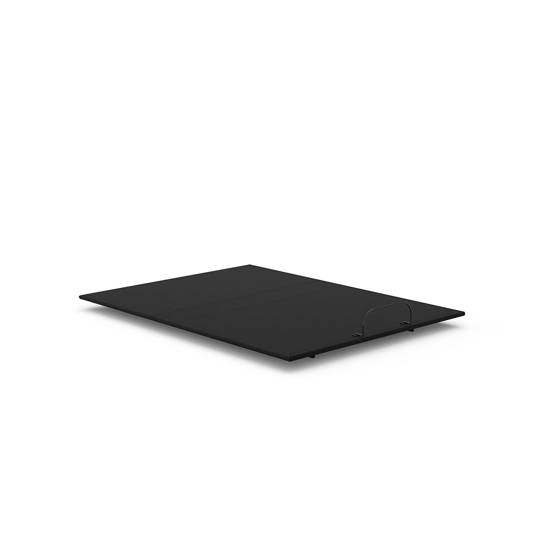 Black Reverie adjustable bed on the floor