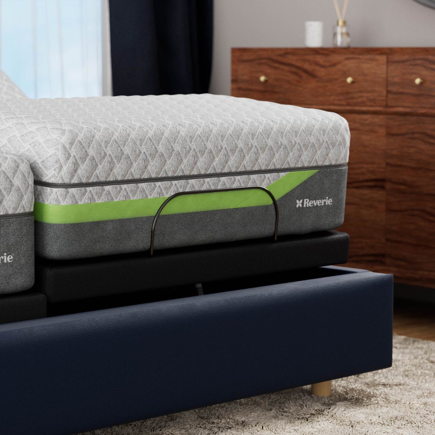 Reverie mattress with green stripe in a bedroom setting