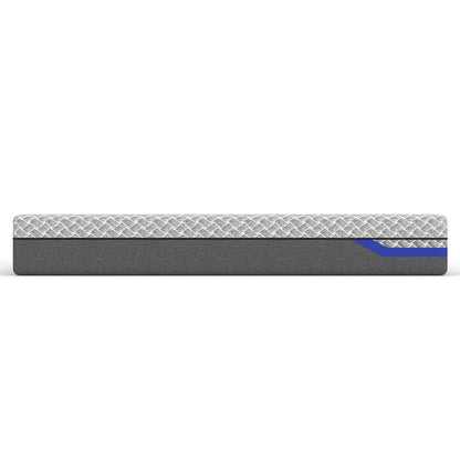 Side view of Reverie gray and blue mattress on a white background. 