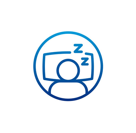 Blue icon of a person with a computer screen and sleep symbols on a white background