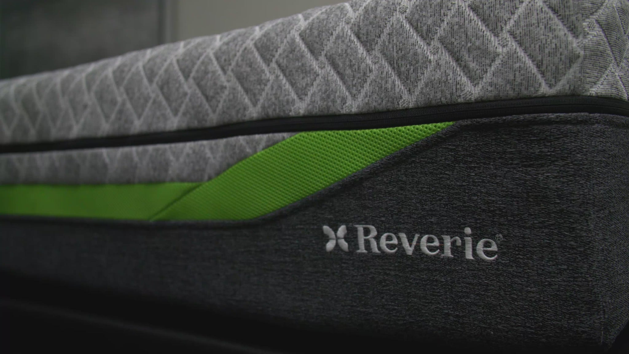 Video of Reverie mattress closeup in a dark room. 